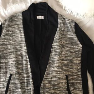 Grey/black mixed jersey blazer; working pockets.